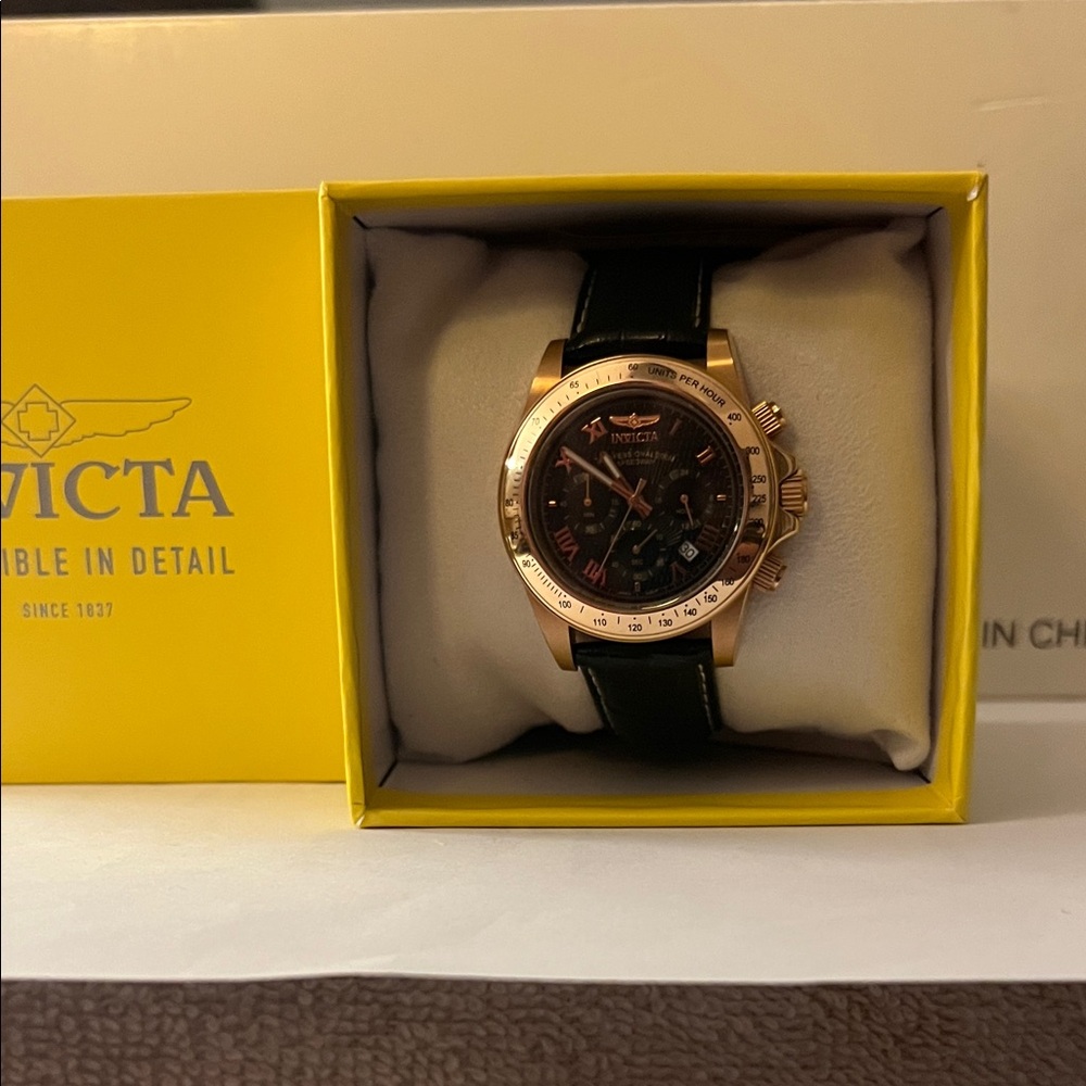 Invicta Black and Gold Chronograph Watch